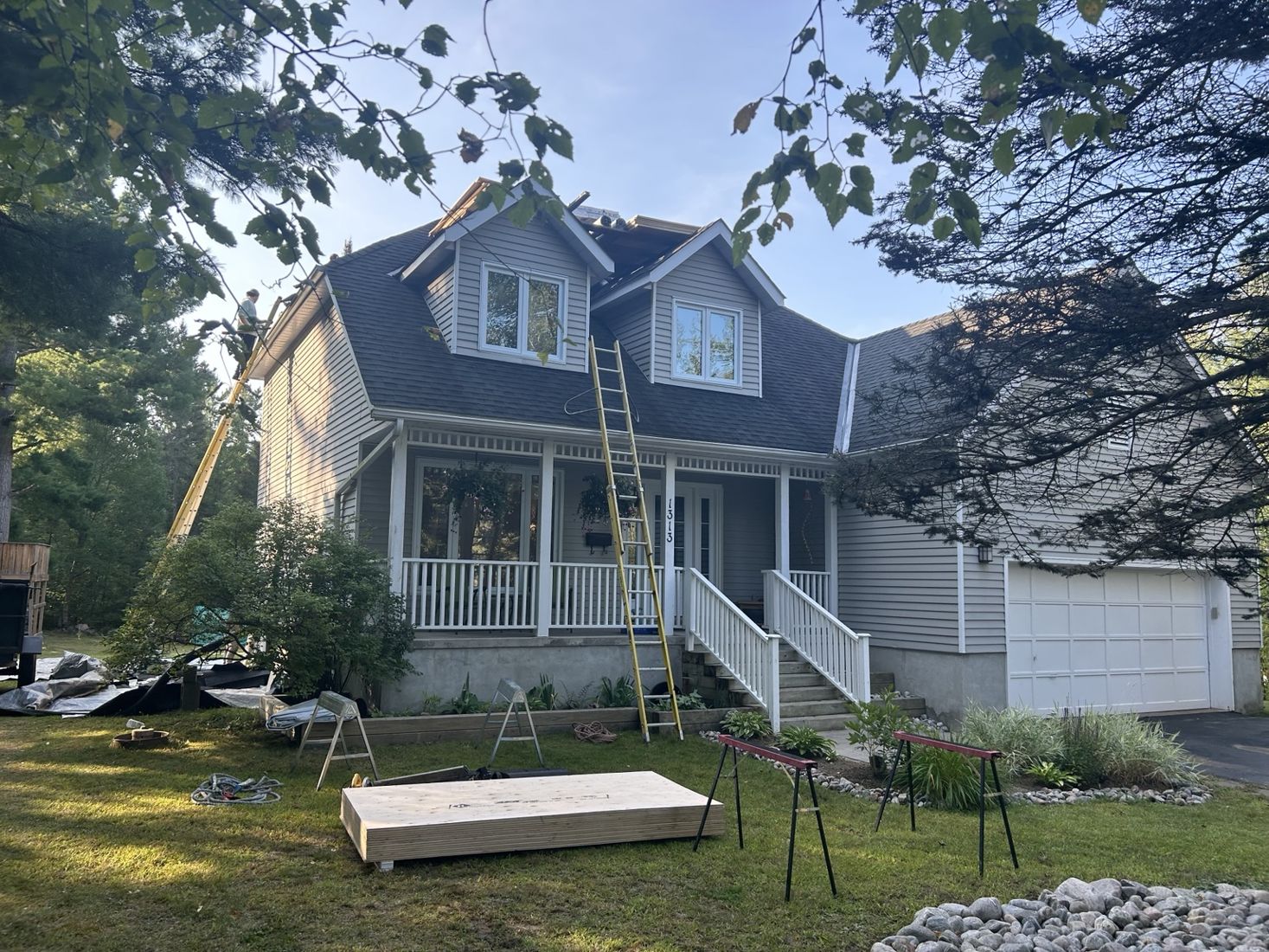 Roofing work at a two-storey home